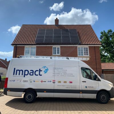 Impact Services van proudly sitting in front of a sola panel installation in East Anglia.